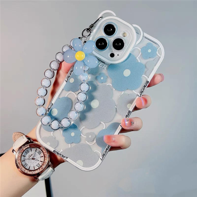 A woman holds a blue flower case featuring a watch and bracelet, highlighting items for sale at grunxstore.