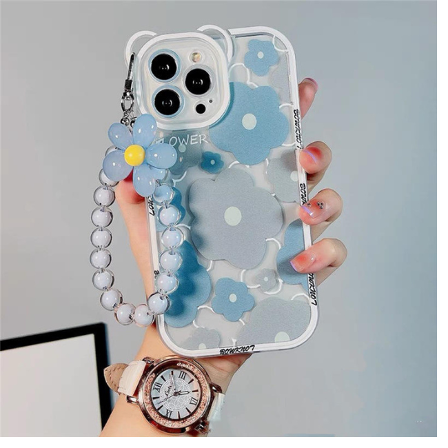 A woman displays a blue flower case with a watch and bracelet, showcasing products from grunxstore.