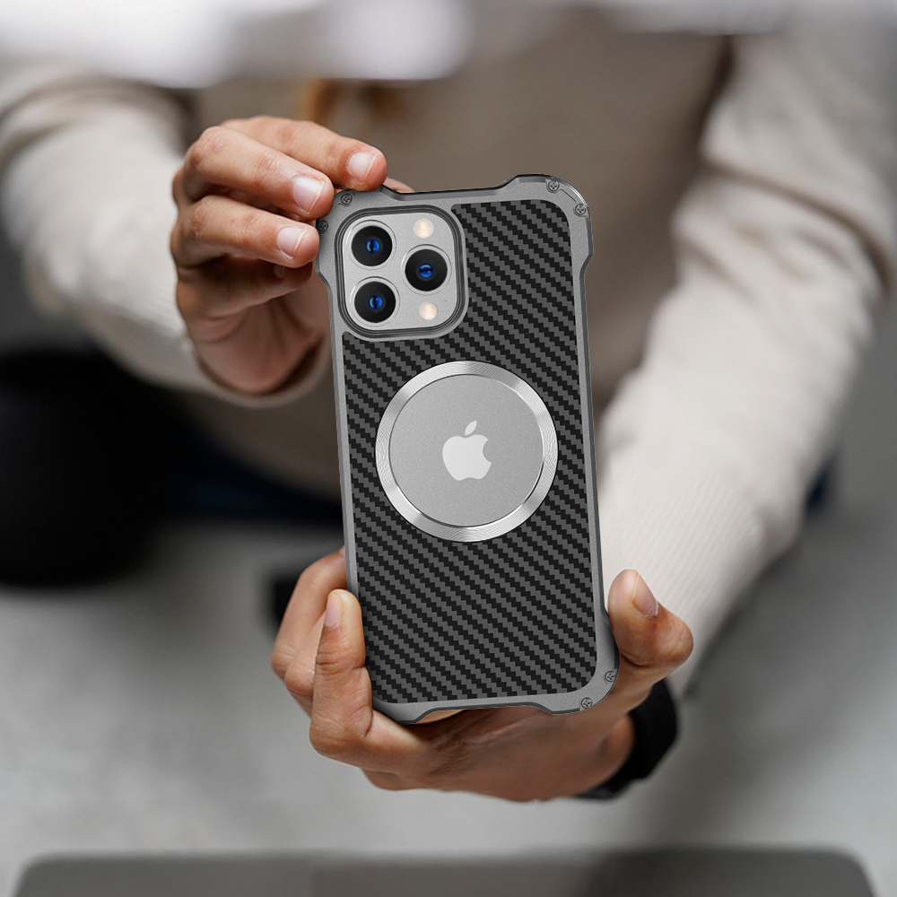 A person showcasing an iPhone 11 encased in a sleek carbon fiber case, highlighting modern smartphone protection.