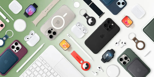 Premium mobile phone accessories flat lay featuring smartphone cases, wireless earbuds, smartwatches, charging pads, stylus pens, and MagSafe accessories arranged on a green-to-white gradient background.