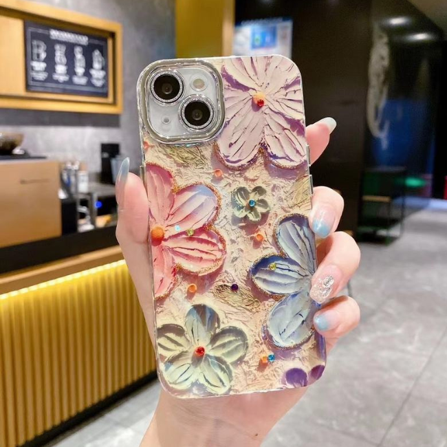 GRUNX Alice slim floral iPhone case in hand showing slim profile precise cutouts side view