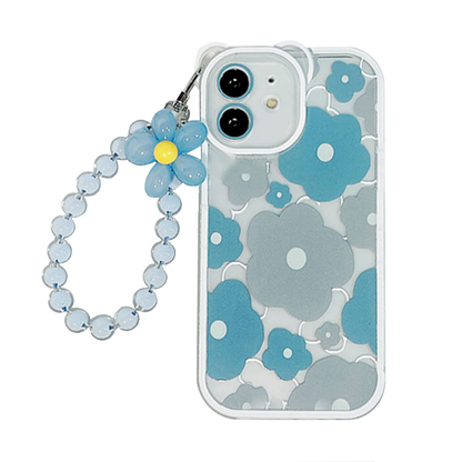 GRUNX Arya diamond iPhone case with fur ball lanyard and raised camera protection in elegant lifestyle setup India