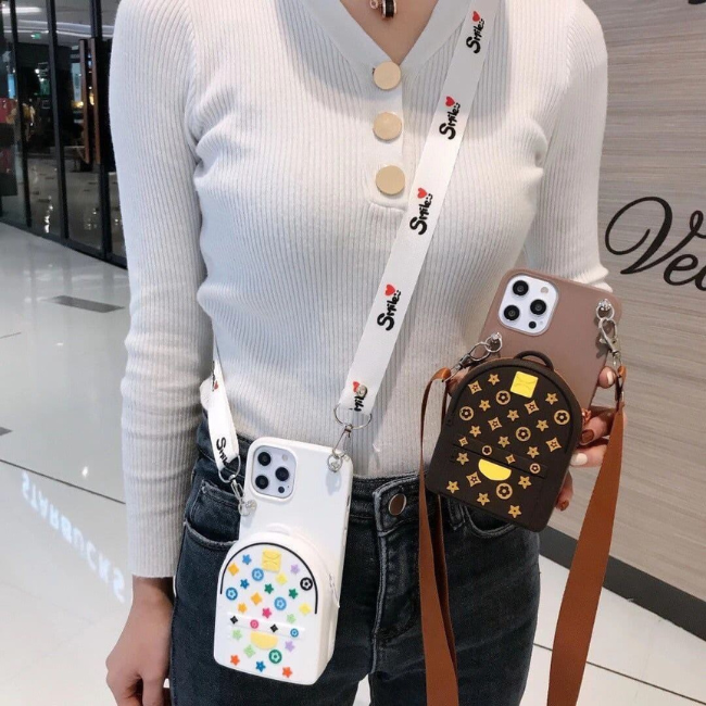  A person presents a star-patterned phone case, indicating it's available for purchase at grunxstore
