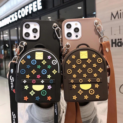 A person displays a star-patterned phone case, showcasing the product available at grunxstore.
