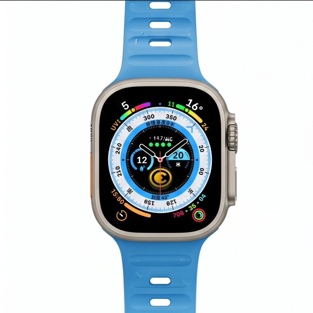 Front-facing view of an Apple Watch Ultra with titanium case and sky blue sport band, displaying the compass and depth gauge watch face clearly