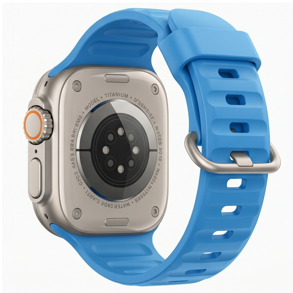Apple Watch Ultra with a light blue silicone sport band shown on a neutral background, highlighting the titanium case and band connector detail