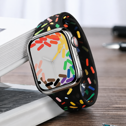 Colorful silicone smartwatch band with rainbow gradient pattern, showcasing vibrant multi-color design for stylish everyday wear