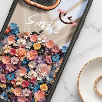 Close-up of iPhone case with rose gold and orange colorful camera ring protector featuring multi-lens design on denim and marble surface