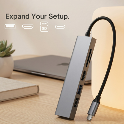 GRUNX Military Grade USB-C adapter 100W connected to MacBook Air M2 with monitor mouse and keyboard in Indian home office