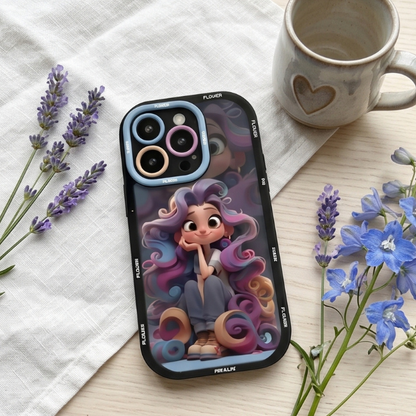 Animated character iPhone case with blue camera ring displayed on marble surface with lavender flowers, ceramic mug with heart design, and blue blossoms