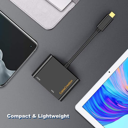 USB-C to HDMI VGA adapter compact and lightweight design placed on desk next to smartphone and tablet