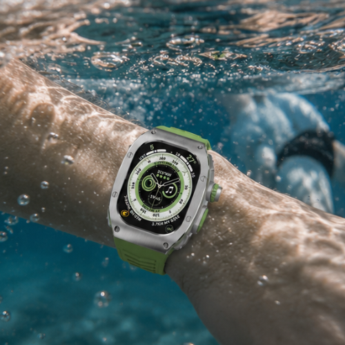 Apple Watch Ultra with olive green rubber band worn on a wrist submerged underwater, showcasing water resistance