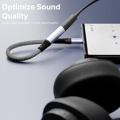 USB-C to 3.5mm audio adapter optimizing sound quality with high resolution crystal audio output connected to smartphone