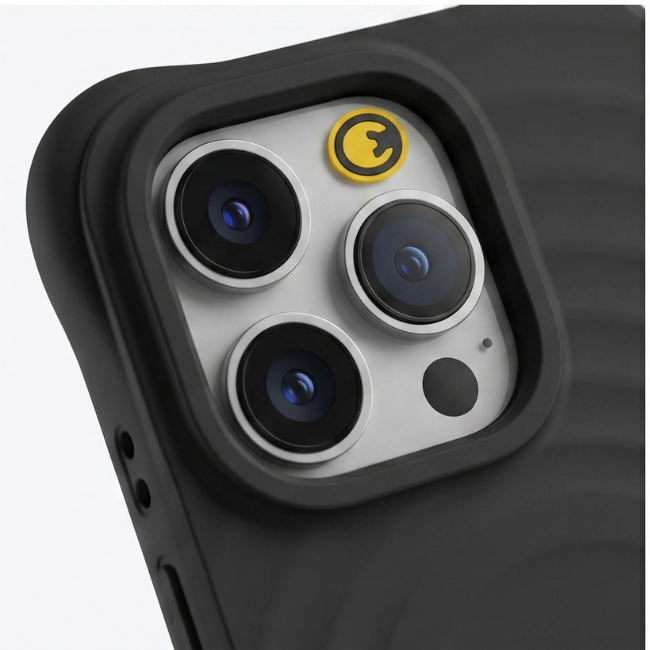 Close-up of black rugged iPhone case showing camera cutout with yellow accent ring
