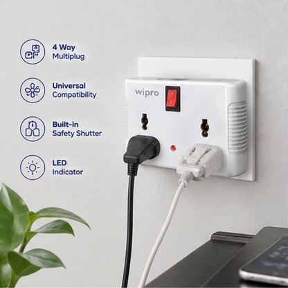 Wipro 4 Way Multiplug Adaptor plugged into wall socket with multiple devices showing universal compatibility and LED indicator