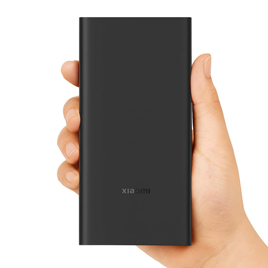 Xiaomi Power Bank 4i 20000mAh black portable charger held in hand showing compact slim size